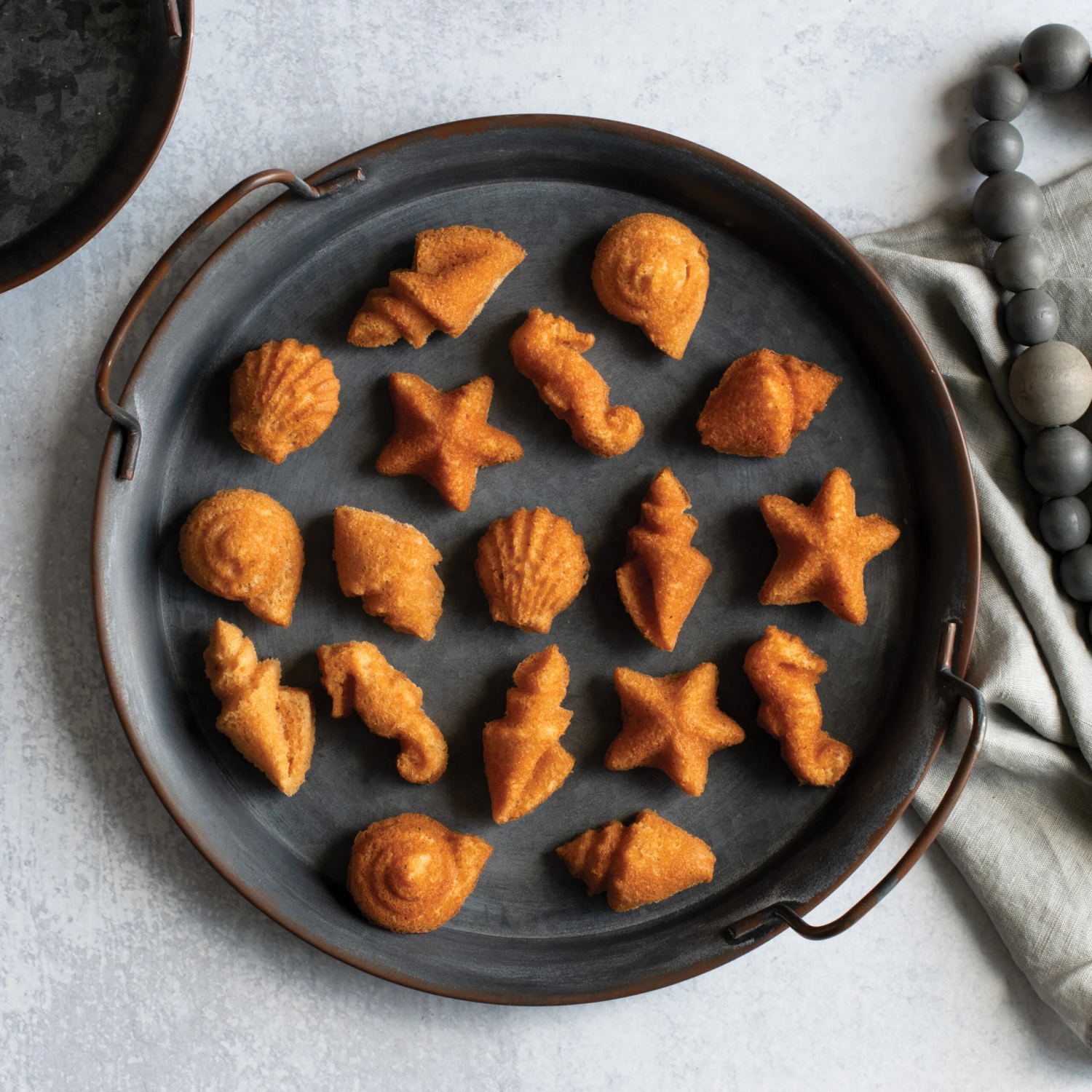 Nordic Ware Sea Shell Cakelet -kakkuvuoka 4 Nordic Ware Sea Shell Cakelet -kakkuvuoka - Image 2